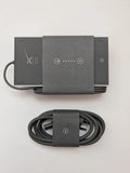 Genuine Starlink Gen 3 power supply in its factory sleeve with the coiled AC cable below it.