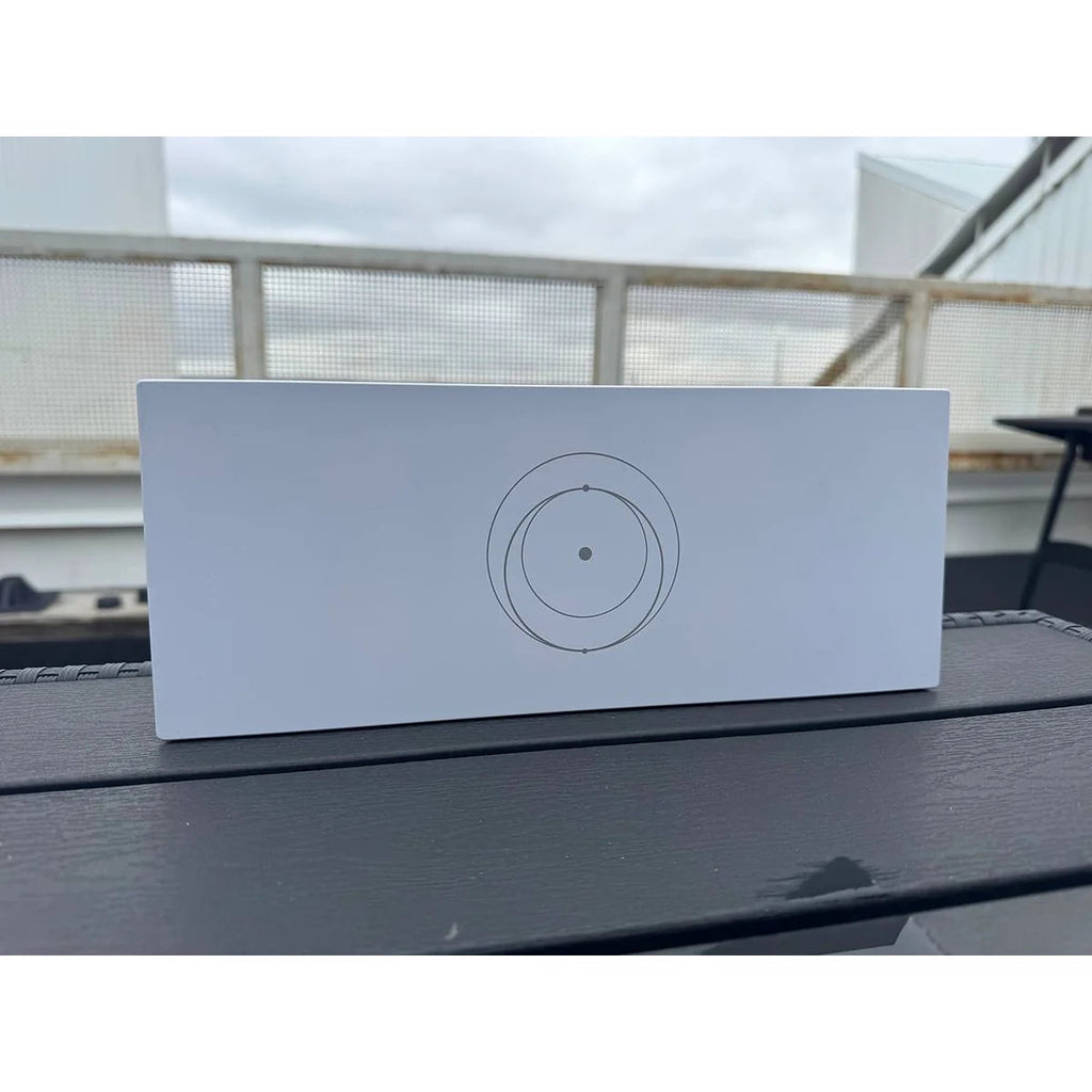 Genuine Starlink Gen 3 router photographed in daylight, showing the clean white housing.