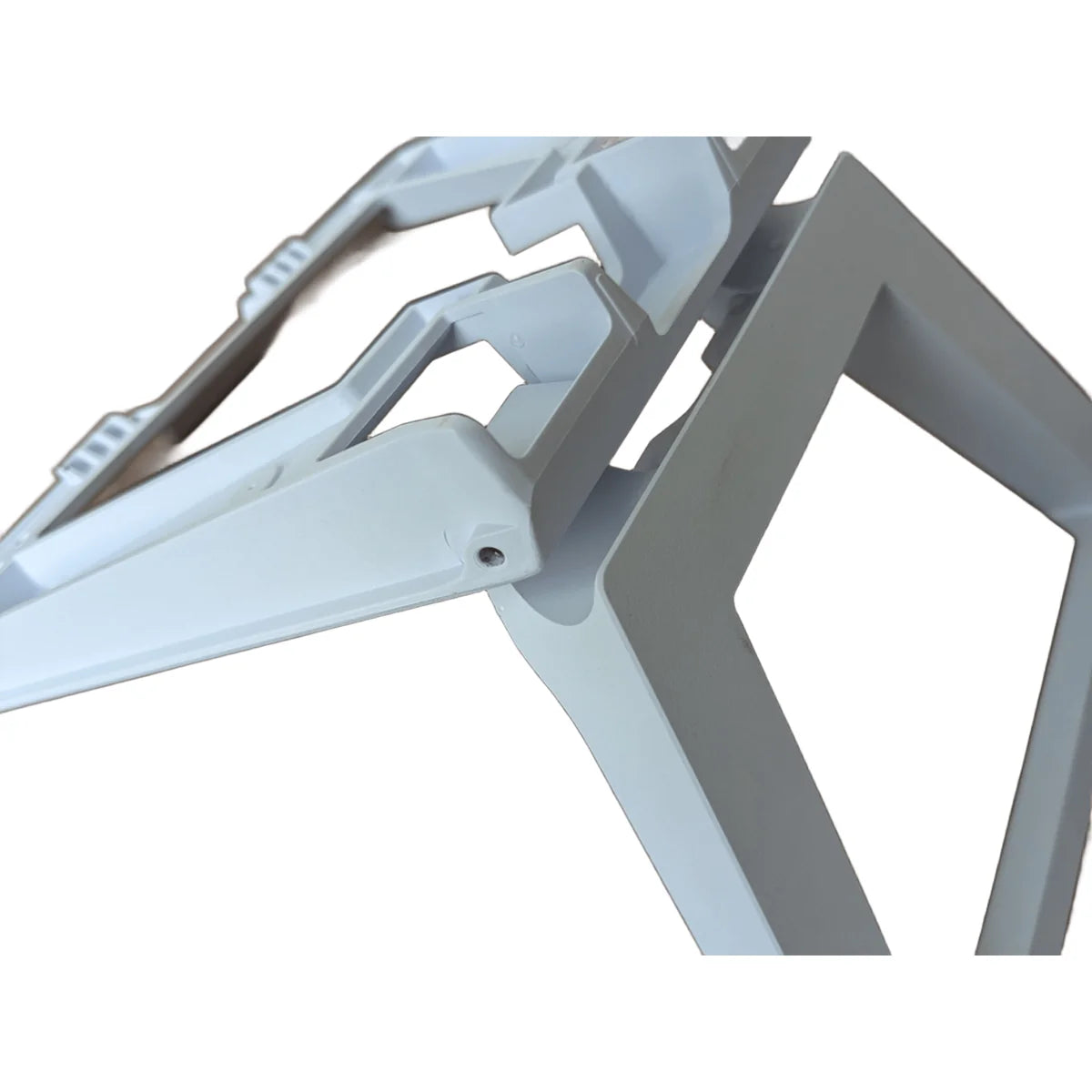 Close-up of the hinge mechanism on the Starlink kickstand base, showing the pivot and stop ribs.