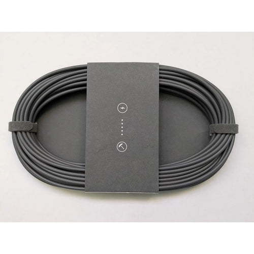 Genuine Starlink Mini DC power cable, 15 m, coiled flat with the original sleeve and hook-and-loop straps.
