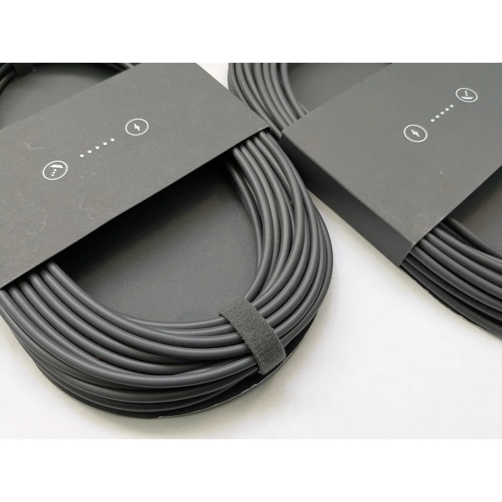 Two genuine Starlink Mini DC power cables side by side, each in its original printed sleeve.