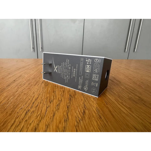 Starlink Mini power supply label showing model UTP-231L, 30 V 2 A 60 W output and US plug pins.