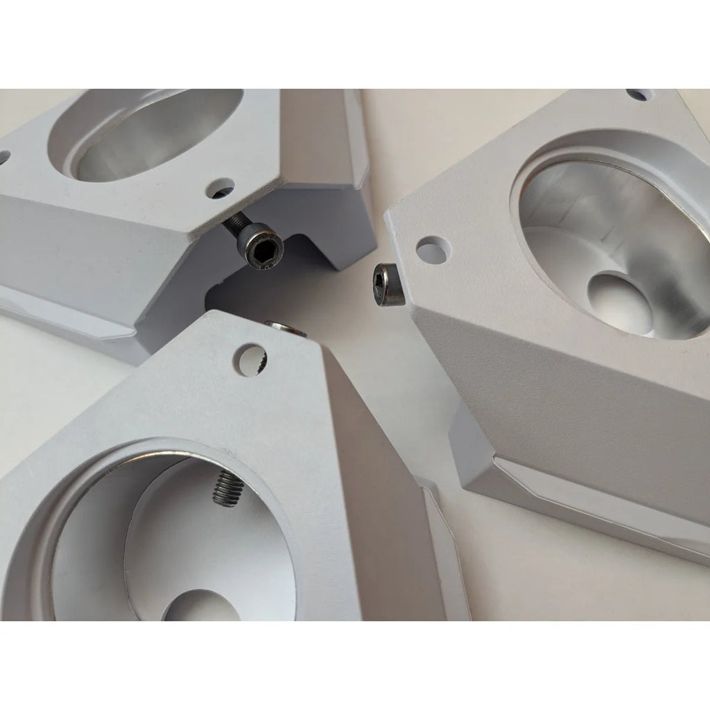 Three genuine Starlink pipe adapters grouped together, showing the clamp screws and bores.