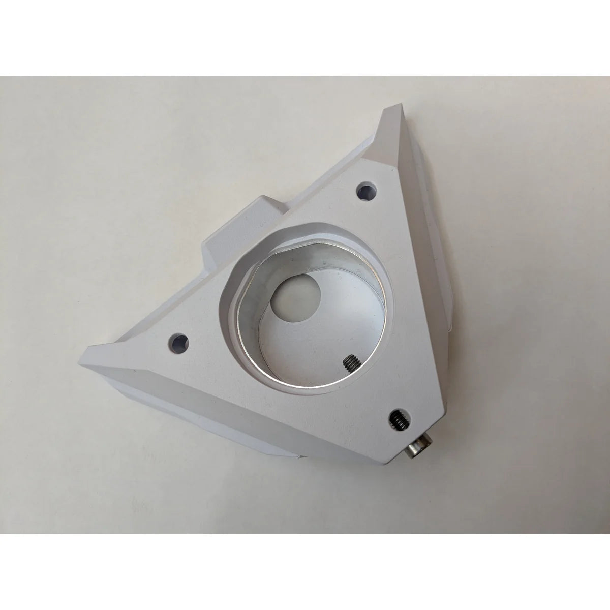 Top view of the Starlink pipe adapter showing the machined bore and the threaded fixing points.