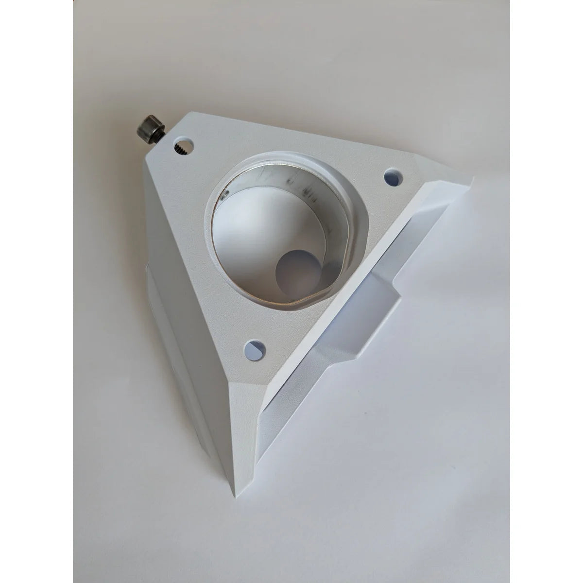 Starlink pipe adapter stood upright, showing the full triangular body and the clamp screw head.