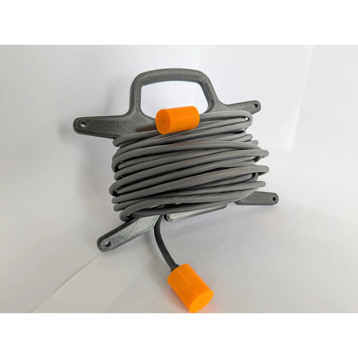 Genuine Starlink RJ45 cable, 15 m, wound on the free StarMax caddy with orange connector caps fitted.
