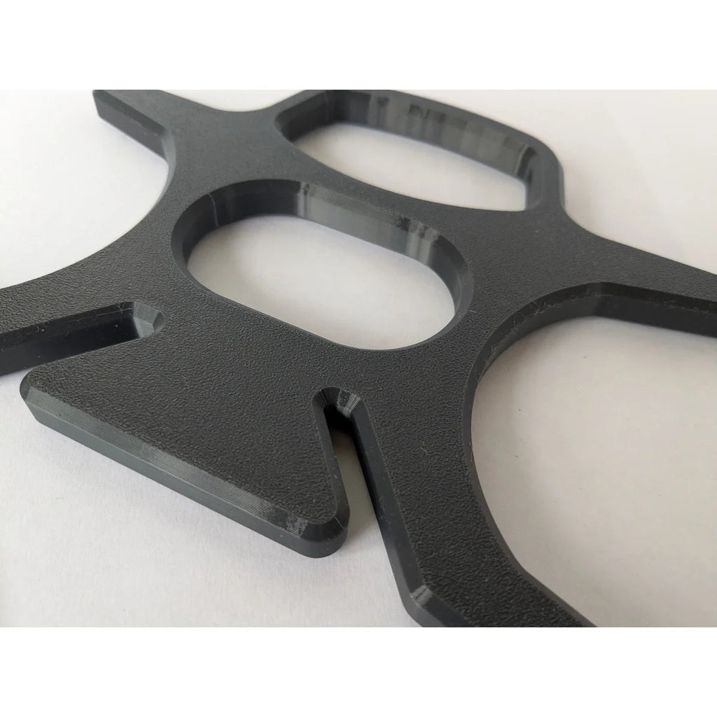 Close-up of the StarMax cable caddy showing the textured surface and solid printed layer walls.