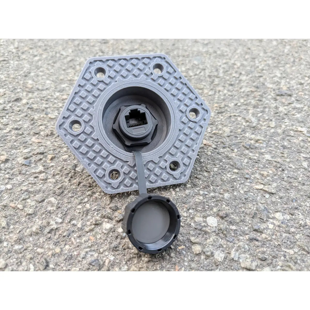 StarMax waterproof RJ45 panel socket in grey, cap unscrewed to show the recessed Ethernet port.