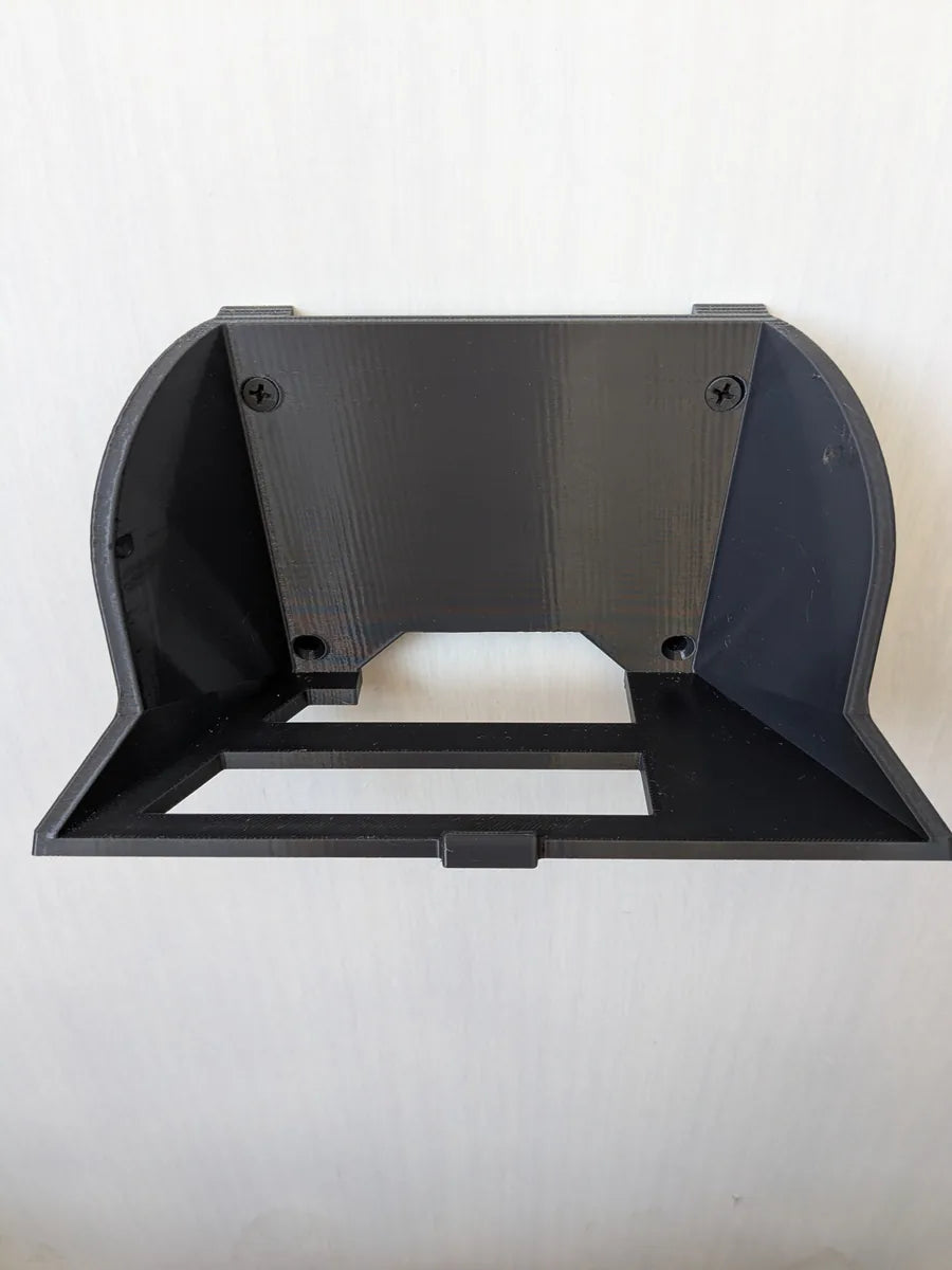 Black StarMax 3D-printed wall mount bracket for the Starlink Gen 2 router, seen from the front.