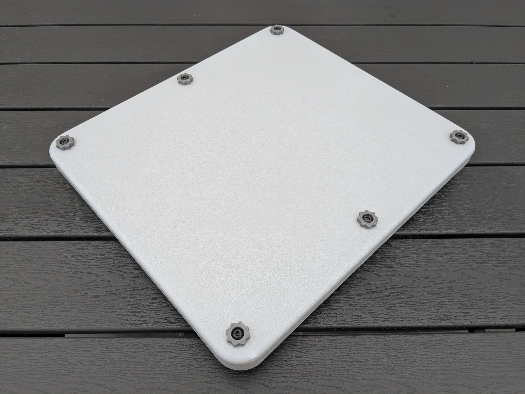 Closed StarMax armor case for Starlink Mini at an angle, showing six sealed corner fasteners.